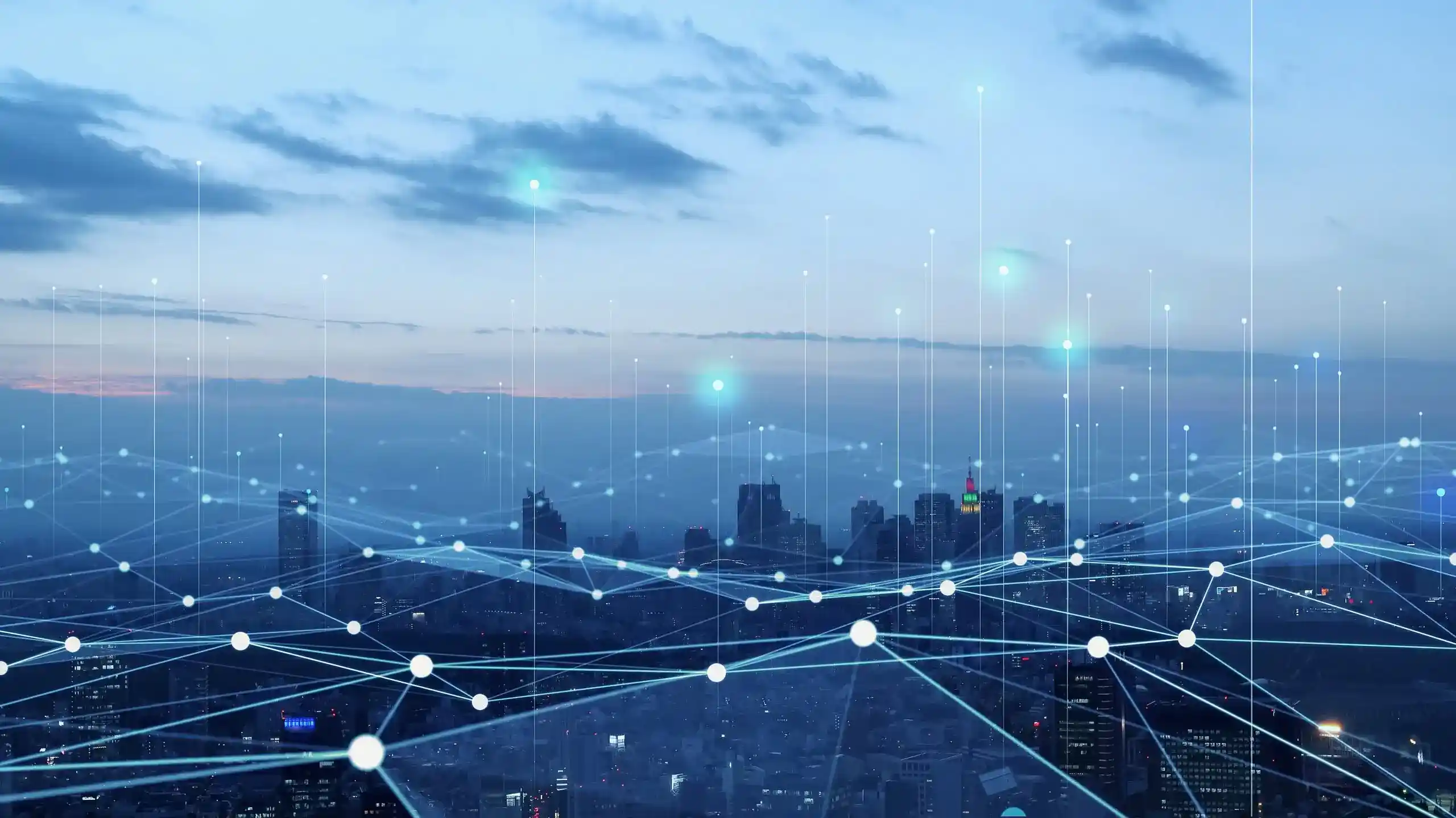A panoramic twilight city skyline overlaid with a glowing blue digital network of connected nodes and vertical light lines.